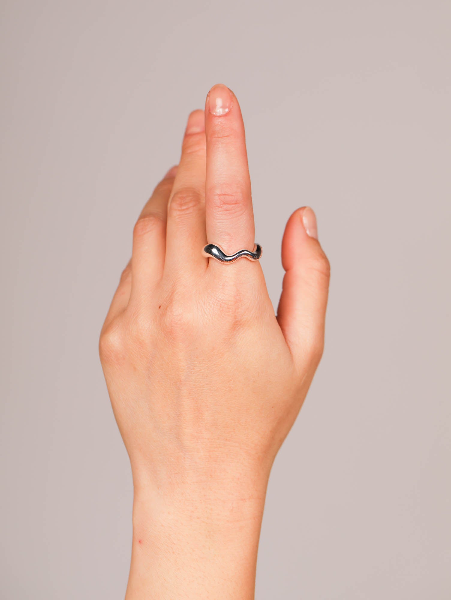 Nāmaka wave ring in sterling silver