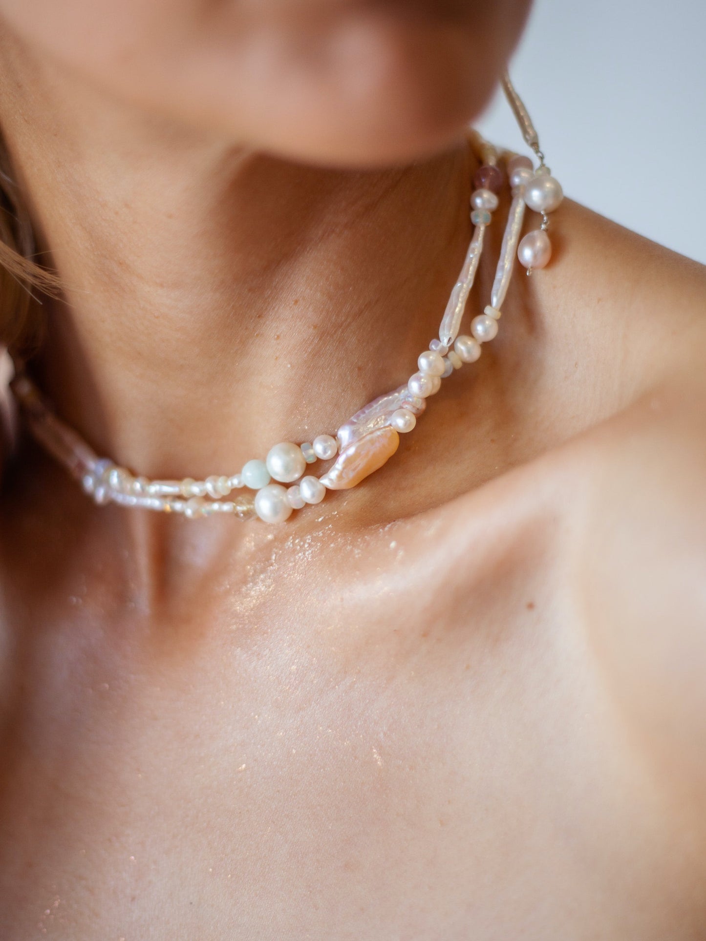 Candy Pearl & Multi-stone Necklace - Glistening in candy colours, and finished with 14 karat Gold hardware, this necklace is absolutely gorgeous. Hand crafted with a variety of Violet Keshi Pearls, South Sea Pearls, Biwa Pearls, Freshwater Pearls & Pink Freshwater Pearls. Combined with a glittery cluster of Australian Opals, Aquamarine, Blue Lace Agate, Jade, and the ultimate - The Super Seven Stone. Designed and made by nāmaka