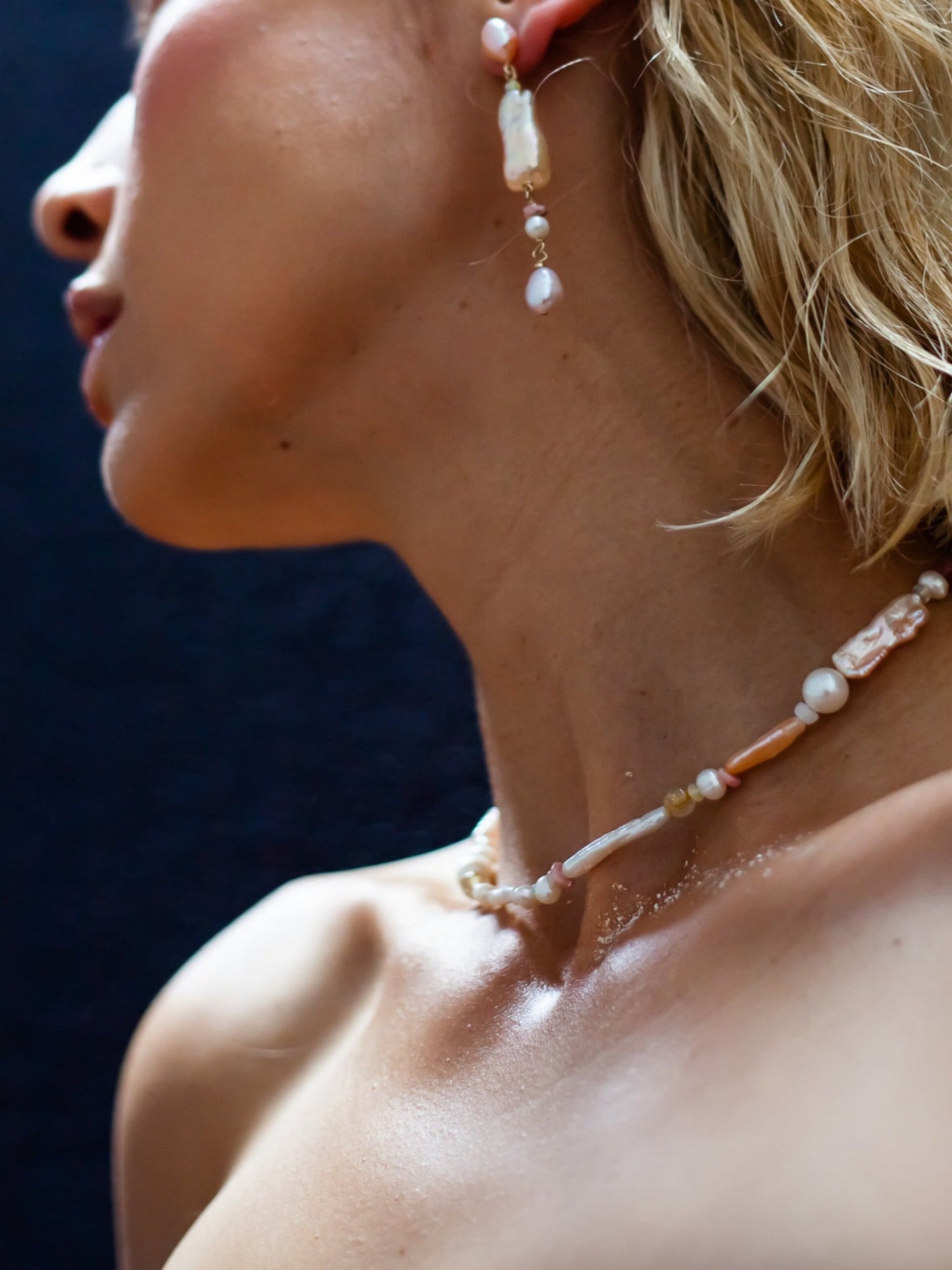 Peach Candy Pearl & Opal Necklace - Glistening in peachy pastel candy colours, and finished with 14 karat Gold hardware, this necklace is absolutely gorgeous. Hand crafted with a variety of Peach and apricot hued Keshi Pearls, Estate re-purposed Akoya Pearls, Biwa Pearls, Freshwater Pearls & Pink Freshwater Pearls. Combined with a glittery cluster of Australian Opals, Pink Lace Agate, and the ultimate - The Super Seven Stone.  Designed and personally handcrafted by nāmaka