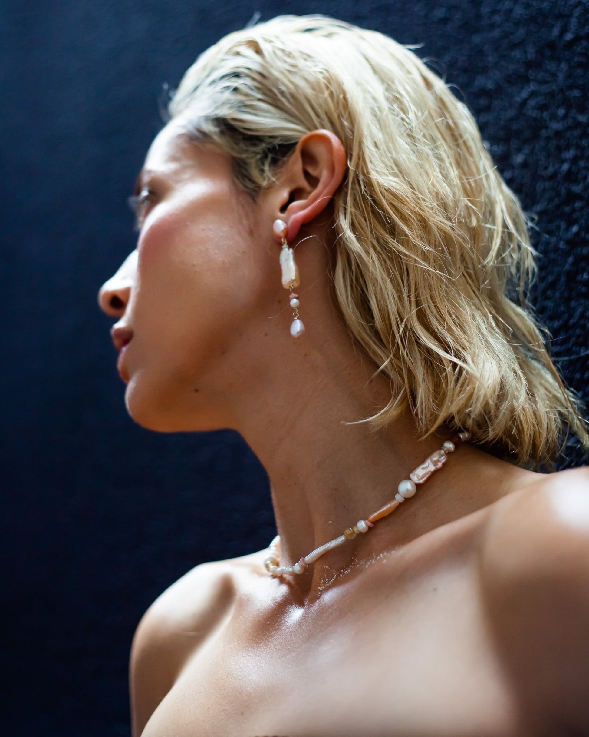 Peach Candy Pearl & Opal Necklace - Glistening in peachy pastel candy colours, and finished with 14 karat Gold hardware, this necklace is absolutely gorgeous. Hand crafted with a variety of Peach and apricot hued Keshi Pearls, Estate re-purposed Akoya Pearls, Biwa Pearls, Freshwater Pearls & Pink Freshwater Pearls. Combined with a glittery cluster of Australian Opals, Pink Lace Agate, and the ultimate - The Super Seven Stone.  Designed and personally handcrafted by nāmaka