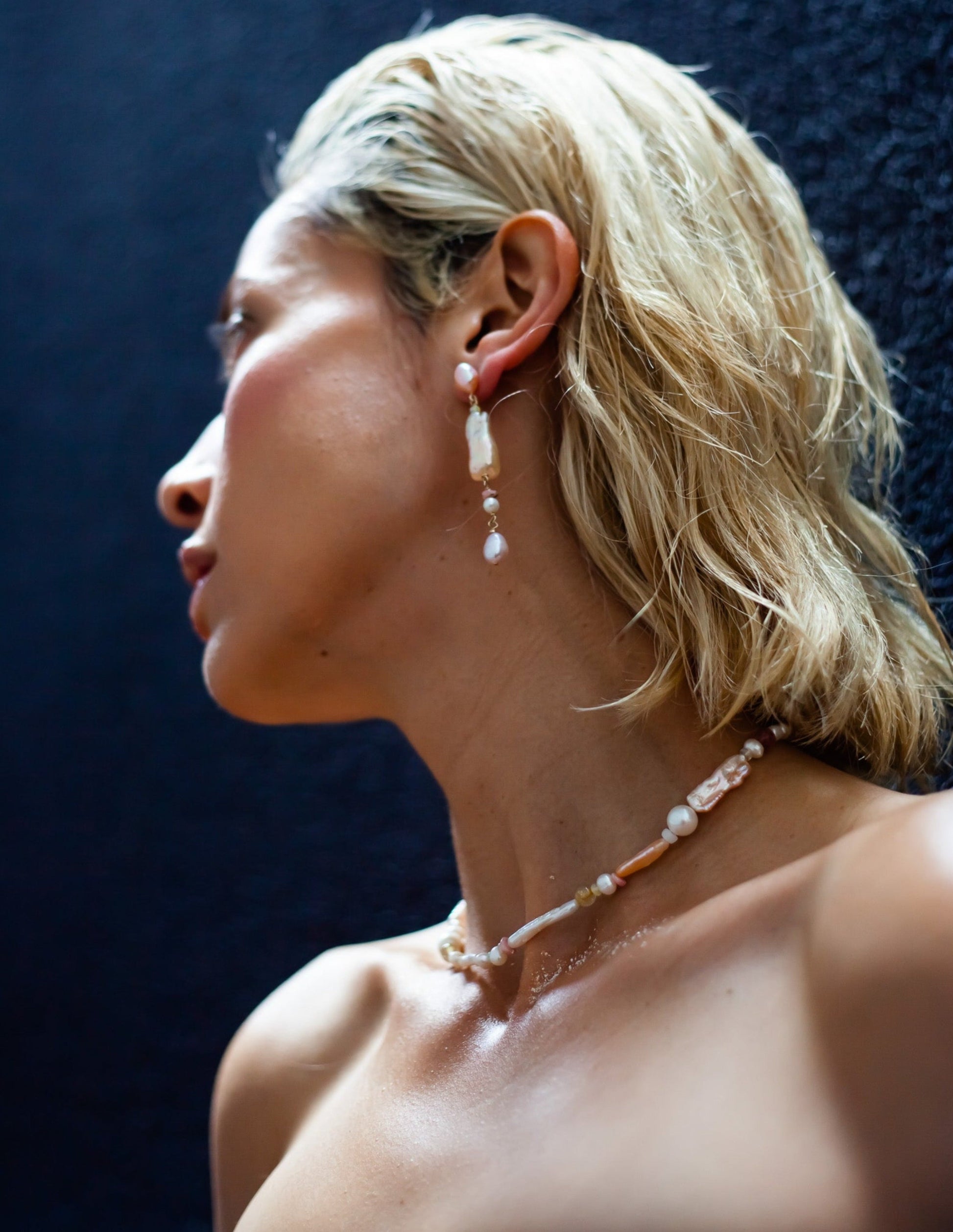 Peach Candy Pearl & Opal Necklace - Glistening in peachy pastel candy colours, and finished with 14 karat Gold hardware, this necklace is absolutely gorgeous. Hand crafted with a variety of Peach and apricot hued Keshi Pearls, Estate re-purposed Akoya Pearls, Biwa Pearls, Freshwater Pearls & Pink Freshwater Pearls. Combined with a glittery cluster of Australian Opals, Pink Lace Agate, and the ultimate - The Super Seven Stone.  Designed and personally handcrafted by nāmaka