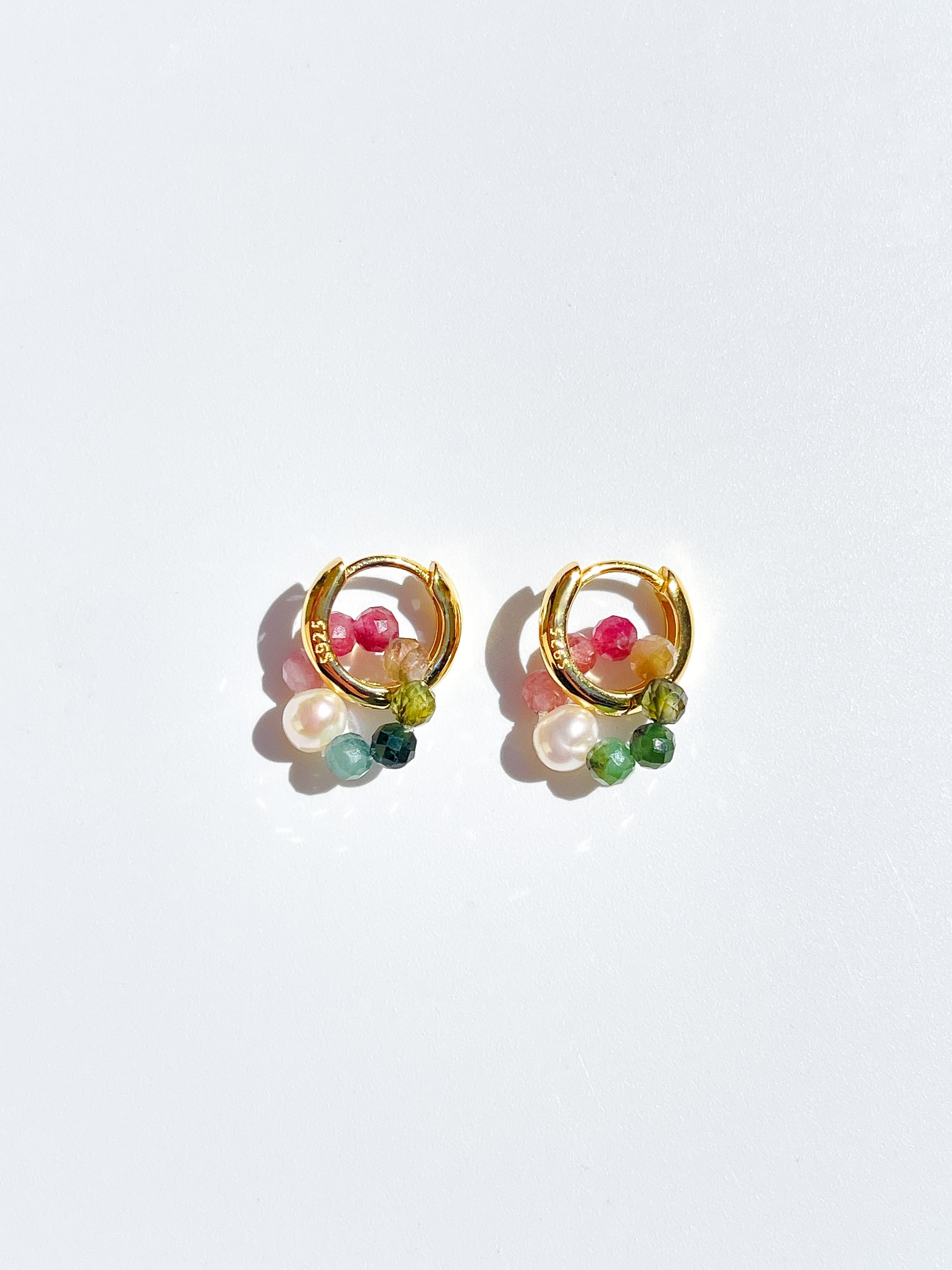 Nāmaka Tourmaline & Pearl Halo Hoops. Hand crafted with sparkling faceted Tourmaline Gems, Freshwater pearls, suspended by 14ct Gold Filled Sterling Silver Hoops.