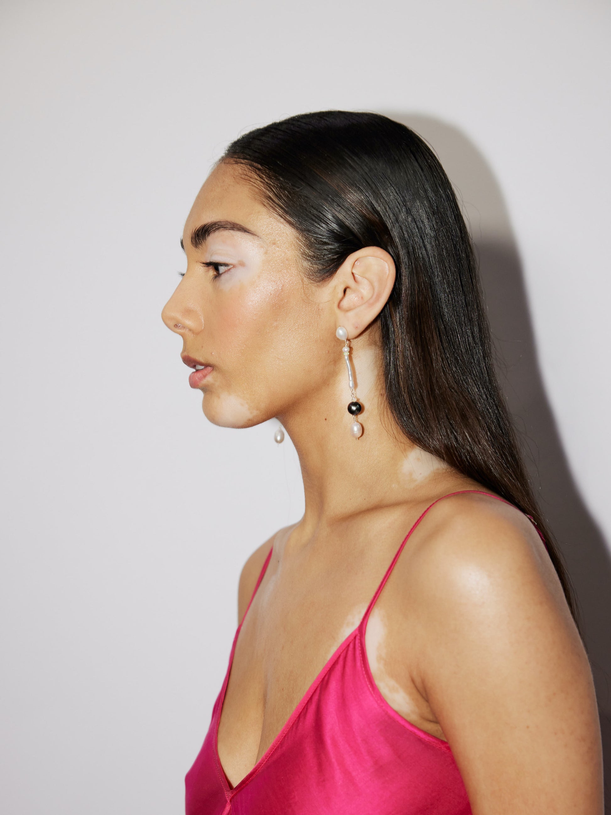 Nāmaka Tahitian Black Pearl & Opal Drop Earrings - These earrings are an absolute showstopper. Hand crafted using Sterling Silver, which suspend a combination of Estate Repurposed Tahitian Black Pearls, Opals, Biwa Pearls, Freshwater Pearls. Finished with Estate Repurposed Violet teardrop AAA pearls. These Nāmaka earrings glisten in candy colours, and are uniquely gorgeous in every way.  Designed & personally handcrafted by Nāmaka in Melbourne Australia