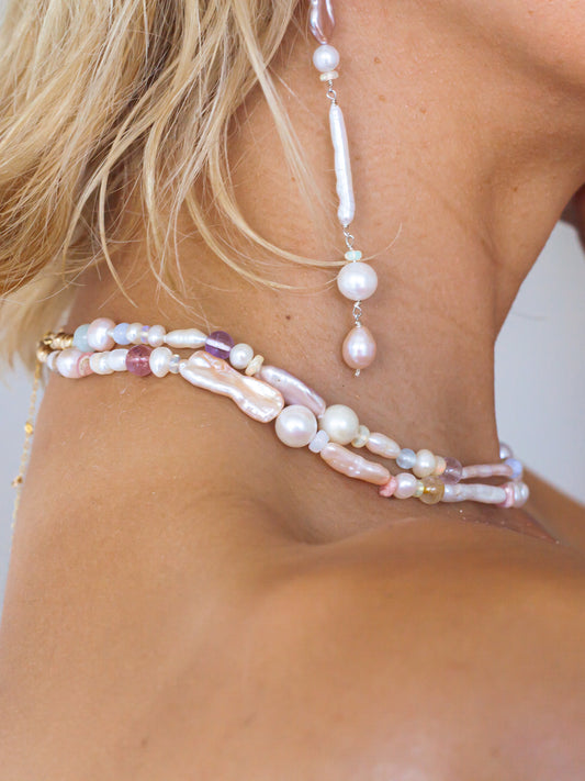 Candy Pearl & Multi-stone Necklace - Glistening in candy colours, and finished with 14 karat Gold hardware, this necklace is absolutely gorgeous. Hand crafted with a variety of Violet Keshi Pearls, South Sea Pearls, Biwa Pearls, Freshwater Pearls & Pink Freshwater Pearls. Combined with a glittery cluster of Australian Opals, Aquamarine, Blue Lace Agate, Jade, and the ultimate - The Super Seven Stone. Designed and made by nāmaka