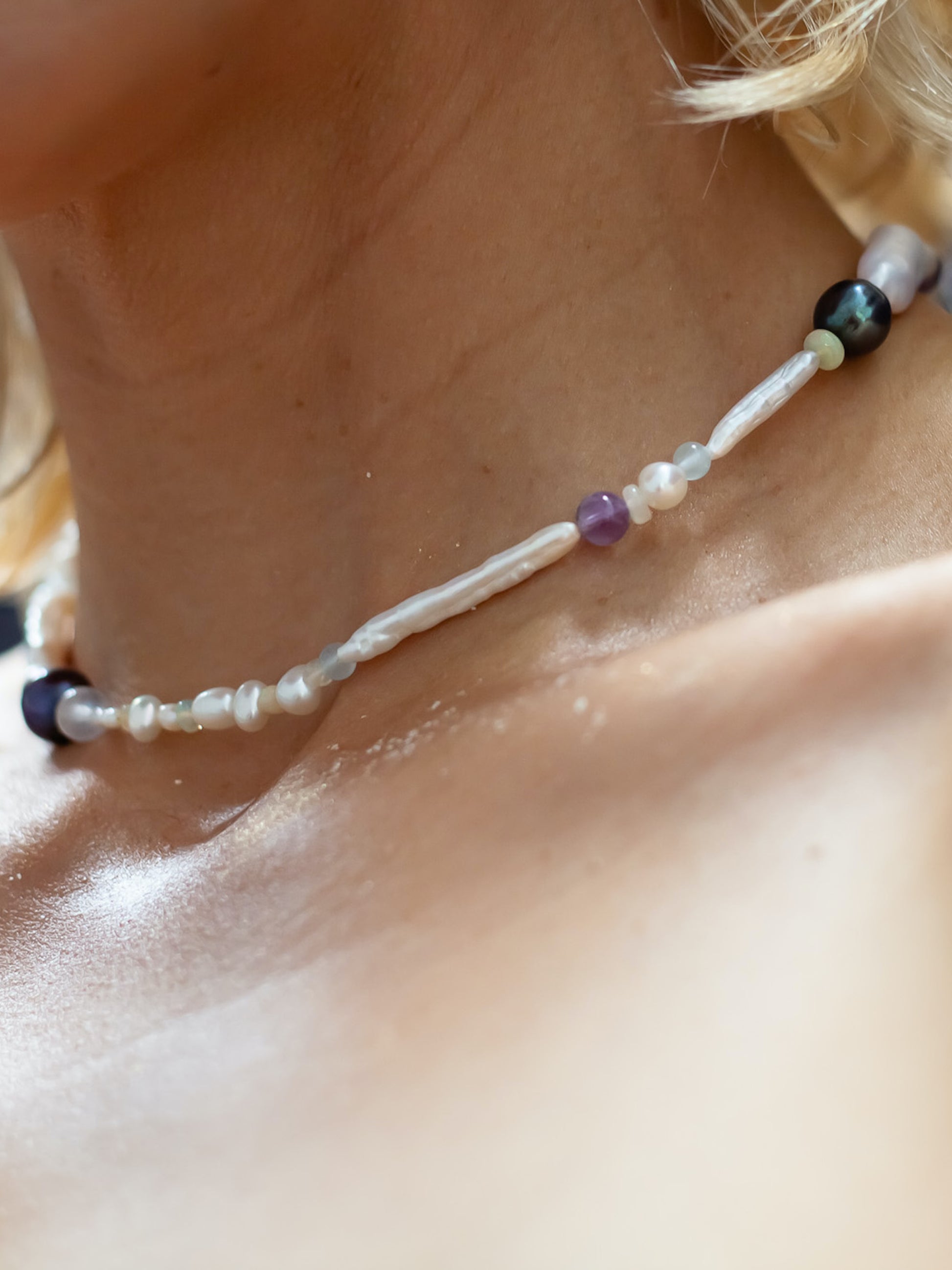 Nāmaka Tahitian Black Pearl & Opal Multi-Stone Choker Necklace - Glistening in candy colours, and finished with Sterling Silver hardware, this necklace is absolutely gorgeous. Hand crafted with a variety of Vibrant White Keshi Pearls, Estate re-purposed Tahitian Black Pearls, Biwa Pearls, Freshwater Pearls & Pink Freshwater Pearls.